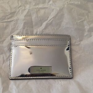 KATE SPADE SILVER CARD HOLDER